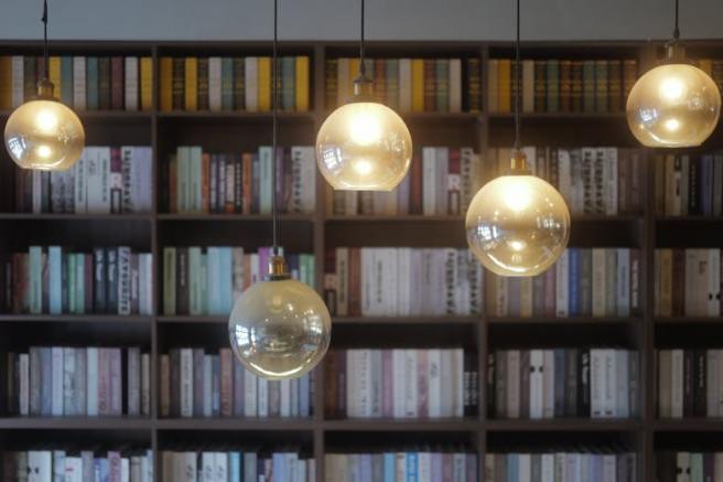 Book stack with pendant light hanging
